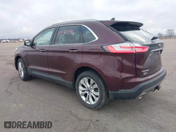 2020 Ford Edge Titanium z VIN 2FMPK4K91LBB56297, wystawiony jako IAAI lot #41938896 z przebiegiem 79 875 mil mil oraz . Historia ofert i sprzedaży dostępna na DreamBid. Obrazek 3.