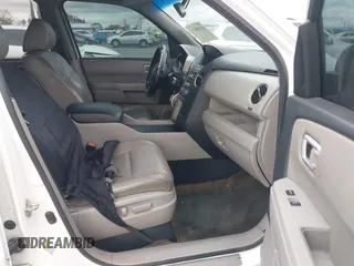 2014 Honda Pilot EX-L with VIN 5FNYF3H54EB003916, listed as a IAAI auction lot 41518679 with 147,456 mi miles. Bid and sale history available at carsss.com. Image 5.