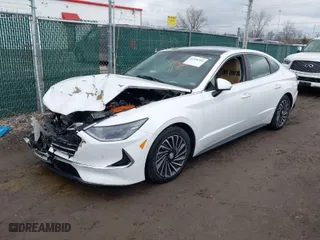 2021 Hyundai Sonata Hybrid Limited with VIN KMHL54JJ7MA031125, listed as a IAAI auction lot 41556366 with 47,562 mi miles. Bid and sale history available at carsss.com. Image 2.