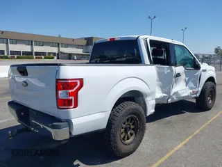 2019 Ford F-150 XL with VIN 1FTEW1C53KKC40961, listed as a IAAI auction lot 41993421 with 63,126 mi miles and . Bid and sale history available at DreamBid. Image 4.