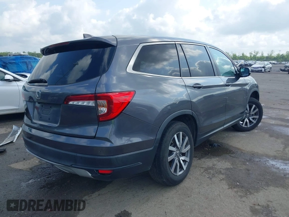 2019 Honda Pilot EX-L with VIN 5FNYF5H52KB039336, listed as a IAAI auction lot 42108456 with 220,307 mi miles and . Bid and sale history available at carsss.com. Image 4.