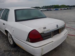 2010 Mercury Grand Marquis LS z VIN 2MEBM7FV5AX606873, wystawiony jako IAAI lot #42216310 z przebiegiem 198 896 mil mil oraz . Historia ofert i sprzedaży dostępna na DreamBid. Obrazek 6.