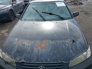 1998 Toyota Camry LE z VIN 4T1BG22K7WU236334, wystawiony jako IAAI lot #41662673 z przebiegiem 182 960 mil mil oraz . Historia ofert i sprzedaży dostępna na DreamBid. Obrazek 12.