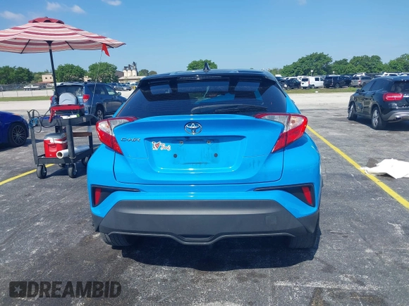 2019 Toyota C-HR XLE with VIN NMTKHMBX6KR097934, listed as a IAAI auction lot 39276687 with 56,973 mi miles. Bid and sale history available at carsss.com. Image 15.