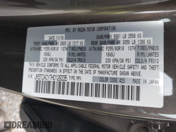 2017 Mazda CX-9 Touring z VIN JM3TCACY7H0129335, wystawiony jako IAAI lot #42289926 z przebiegiem 60 425 mil mil oraz . Historia ofert i sprzedaży dostępna na DreamBid. Obrazek 9.