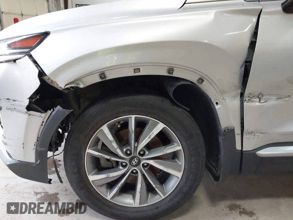 2019 Hyundai Santa Fe SEL with VIN 5NMS33AD3KH119117, listed as a IAAI auction lot 40968190 with 100,350 mi miles and . Bid and sale history available at DreamBid. Image 6.