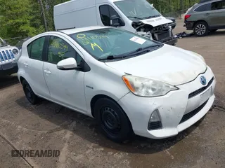 2012 Toyota Prius c One with VIN JTDKDTB30C1501667, listed as a IAAI auction lot 42110544 with 238,728 mi miles. Bid and sale history available at carsss.com. Image 1.