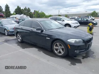 2012 BMW 5 Series 528i with VIN WBAXG5C55CDX02405, listed as a IAAI auction lot 42127069 with 155,764 mi miles. Bid and sale history available at carsss.com. Image 1.