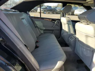 1996 Mercedes-Benz E Class with VIN WDBJF20F5TJ021801, listed as a Copart auction lot 80188074 with 196,397 mi miles and Salvage Title. Bid and sale history available at carsss.com. Image 10.