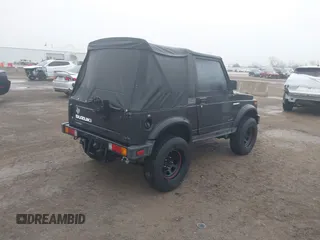 1986 Suzuki Samurai z VIN JS4JC51C4G4118117, wystawiony jako IAAI lot #41589925 z przebiegiem 70 607 mil mil oraz . Historia ofert i sprzedaży dostępna na DreamBid. Obrazek 4.