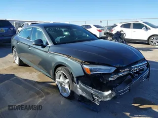 2018 Audi A5 Sportback Premium z VIN WAUDNCF52JA044291, wystawiony jako IAAI lot #41219360 z przebiegiem 86 273 mil mil oraz . Historia ofert i sprzedaży dostępna na DreamBid. Obrazek 1.
