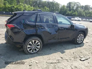 2023 Toyota RAV4 XLE Premium with VIN 2T3A1RFV0PC383809, listed as a Copart auction lot 59938405 with 33,206 mi miles and Salvage title. Bid and sale history available at DreamBid. Image 3.