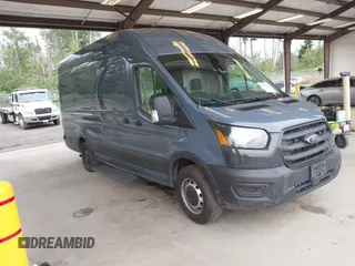 2020 Ford Transit Cargo with VIN 1FTBR3X88LKA27953, listed as a IAAI auction lot 42615658 with 61,235 mi miles and . Bid and sale history available at DreamBid. Image 1.
