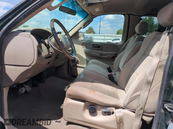 2003 Ford F-150 XL with VIN 2FTRX172X3CA58789, listed as a Copart auction lot 57986695 with 160,124 mi miles and Salvage title. Bid and sale history available at DreamBid. Image 7.
