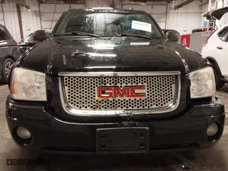 2004 GMC Envoy SLE with VIN 1GKDT13S542265104, listed as a IAAI auction lot 41884797 with 154,190 mi miles. Bid and sale history available at carsss.com. Image 13.