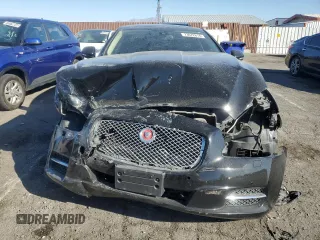 2014 Jaguar XJ with VIN SAJWA2GZXE8V59542, listed as a Copart auction lot 73672614 with 105,328 mi miles and Salvage Title. Bid and sale history available at carsss.com. Image 5.