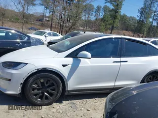 2023 Tesla Model X with VIN 7SAXCDE50PF414198, listed as a IAAI auction lot 41880957 with Not Provided miles and . Bid and sale history available at DreamBid. Image 13.