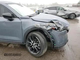 2024 Mazda CX-5 S Carbon Edition z VIN JM3KFBCM6R0367121, wystawiony jako Copart lot #51570125 z przebiegiem 49 762 mil mil oraz Szkody całkowita. Historia ofert i sprzedaży dostępna na DreamBid. Obrazek 10.