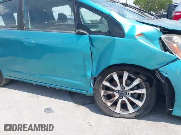 2012 Honda Fit Sport with VIN JHMGE8H57CC005793, listed as a IAAI auction lot 42227191 with 116,231 mi miles and . Bid and sale history available at DreamBid. Image 16.