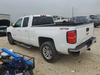 2018 Chevrolet Silverado 1500 LT with VIN 1GCVKREC5JZ106299, listed as a Copart auction lot 54502425 with 115,459 mi miles and Clean Title. Bid and sale history available at DreamBid. Image 2.