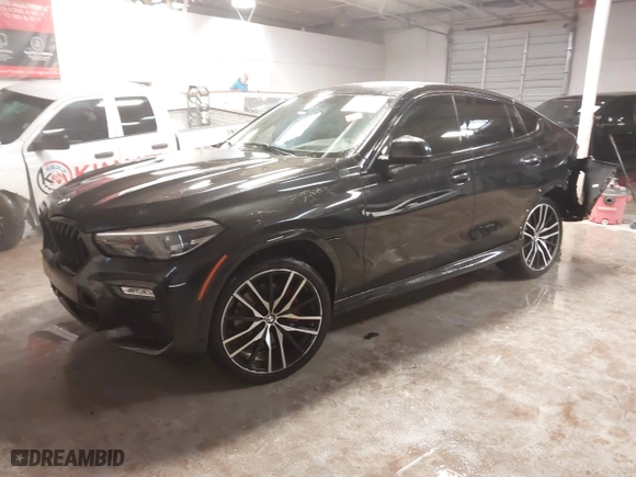 2021 BMW X6 xDrive40i with VIN 5UXCY6C03M9E61703, listed as a IAAI auction lot 41602401 with 1 mi miles. Bid and sale history available at carsss.com. Image 2.