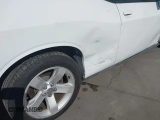 2013 Dodge Challenger SXT z VIN 2C3CDYAG8DH569468, wystawiony jako IAAI lot #41792206 z przebiegiem 161 439 mil mil oraz . Historia ofert i sprzedaży dostępna na DreamBid. Obrazek 19.