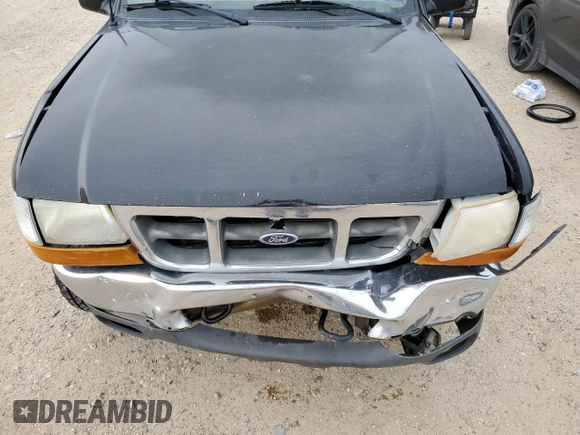 2000 Ford Ranger XLT with VIN 1FTZR15X7YPB39800, listed as a Copart auction lot 55661405 with 228,926 mi miles and Salvage title. Bid and sale history available at DreamBid. Image 11.