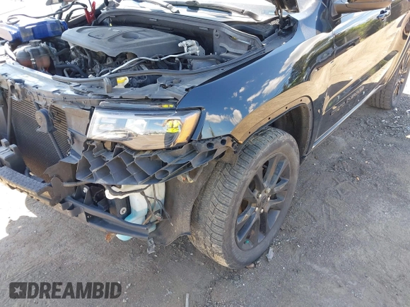 2018 Jeep Grand Cherokee Altitude with VIN 1C4RJFAG6JC147832, listed as a IAAI auction lot 42190737 with 104,280 mi miles and . Bid and sale history available at DreamBid. Image 6.