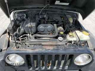 2004 Jeep Wrangler SE with VIN 1J4FA29124P796031, listed as a Copart auction lot 56875525 with 239,488 mi miles and Clean title. Bid and sale history available at DreamBid. Image 11.