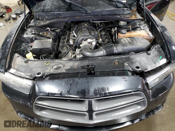 2012 Dodge Charger Police z VIN 2C3CDXAT4CH240370, wystawiony jako Copart lot #58941035 z przebiegiem 140 187 mil mil oraz Szkoda całkowita • Salvage title. Historia ofert i sprzedaży dostępna na DreamBid. Obrazek 11.