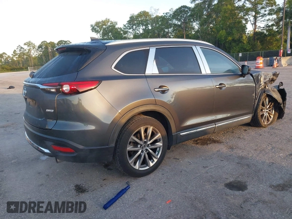 2019 Mazda CX-9 Signature with VIN JM3TCBEY5K0331147, listed as a IAAI auction lot 42026101 with 64,499 mi miles and . Bid and sale history available at DreamBid. Image 4.