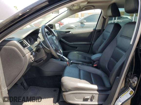 2014 Volkswagen Jetta TDI w/Premium with VIN 3VWLL7AJ8EM367587, listed as a Copart auction lot 63670815 with 129,289 mi miles and Clean title. Bid and sale history available at DreamBid. Image 7.