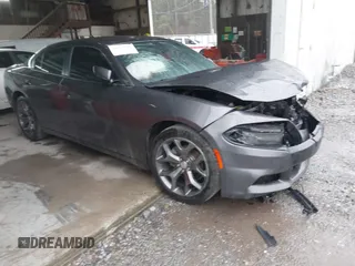 2015 Dodge Charger SXT with VIN 2C3CDXHG8FH848115, listed as a IAAI auction lot 41912162 with 171,229 mi miles and . Bid and sale history available at DreamBid. Image 1.