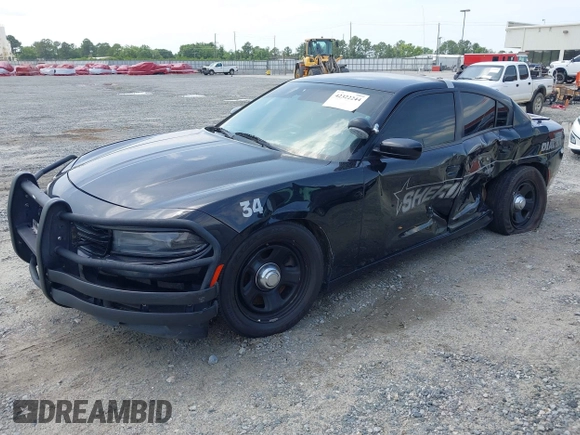 2021 Dodge Charger Police z VIN 2C3CDXAT7MH523170, wystawiony jako IAAI lot #42322244 z przebiegiem 90 825 mil mil oraz . Historia ofert i sprzedaży dostępna na DreamBid. Obrazek 2.