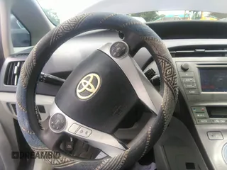 2012 Toyota Prius One z VIN JTDKN3DU5C1533257, wystawiony jako IAAI lot #42399369 z przebiegiem 221 416 mil mil oraz . Historia ofert i sprzedaży dostępna na DreamBid. Obrazek 6.