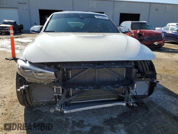 2018 BMW M3 z VIN WBS8M9C55J5L00567, wystawiony jako Copart lot #64514952 z przebiegiem 28 149 mil mil oraz . Historia ofert i sprzedaży dostępna na DreamBid. Obrazek 5.