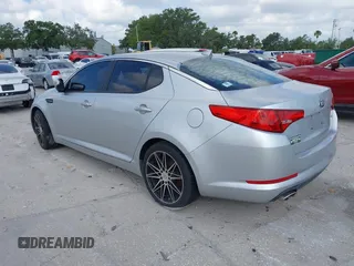2013 Kia Optima LX with VIN KNAGM4A75D5380478, listed as a IAAI auction lot 42153829 with 82,845 mi miles. Bid and sale history available at carsss.com. Image 3.