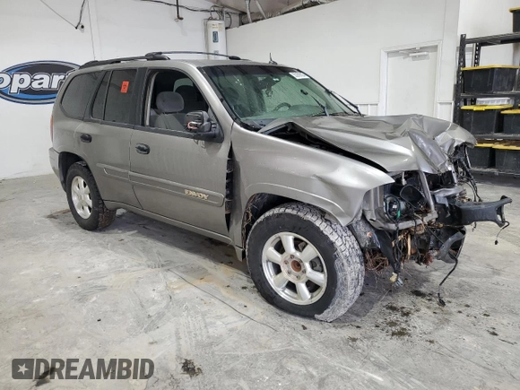 2005 GMC Envoy SLE с VIN 1GKDS13S752274178, выставлен на аукционе Copart как лот 55289005 с пробегом 199 378 миль миль и Списание • Salvage title. История ставок и продаж доступна на DreamBid. Изображение 4.