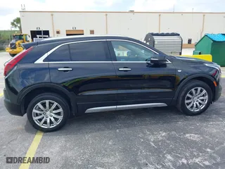 2023 Cadillac XT4 FWD Premium Luxury with VIN 1GYFZCR44PF170452, listed as a IAAI auction lot 42084960 with 22,212 mi miles. Bid and sale history available at carsss.com. Image 13.