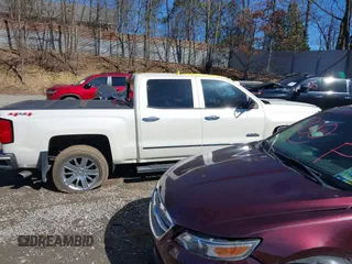 2014 Chevrolet Silverado 1500 High Country with VIN 3GCUKTEJ7EG372338, listed as a IAAI auction lot 41849096 with 69,010 mi miles and . Bid and sale history available at DreamBid. Image 13.
