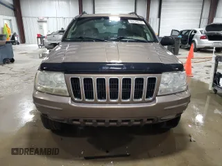 2002 Jeep Grand Cherokee Limited with VIN 1J4GW58NX2C248892, listed as a Copart auction lot 55574615 with 164,010 mi miles and Salvage title. Bid and sale history available at DreamBid. Image 5.