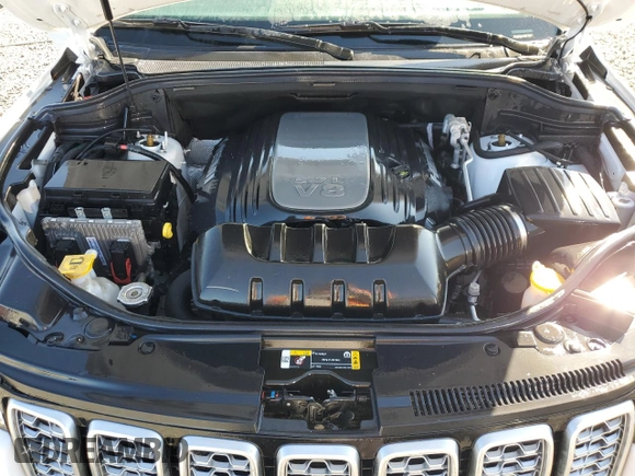 2021 Jeep Grand Cherokee Summit with VIN 1C4RJFJT9MC727660, listed as a Copart auction lot 74756814 with 0 mi miles and Salvage Title. Bid and sale history available at carsss.com. Image 12.