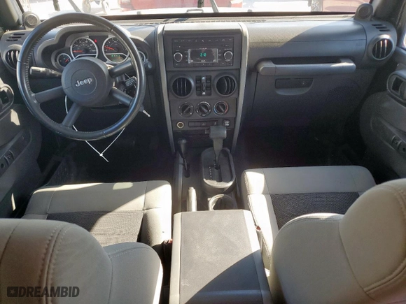 2010 Jeep Wrangler Unlimited Sport with VIN 1J4BA3H1XAL164225, listed as a Copart auction lot 49873055 with 75,665 mi miles and Salvage Title. Bid and sale history available at carsss.com. Image 8.