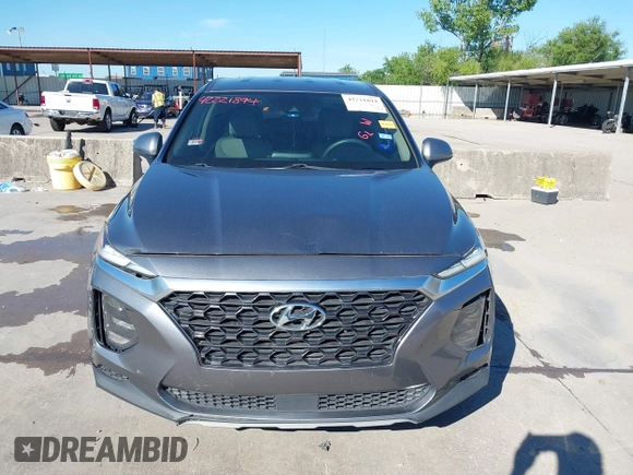 2019 Hyundai Santa Fe SE z VIN 5NMS23AD9KH037539, wystawiony jako IAAI lot #42221894 z przebiegiem 87 755 mil mil oraz . Historia ofert i sprzedaży dostępna na DreamBid. Obrazek 12.