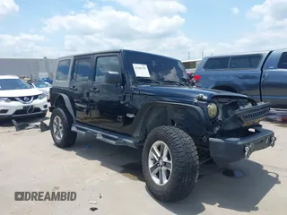 2008 Jeep Wrangler Unlimited Sahara with VIN 1J4GB59198L619802, listed as a IAAI auction lot 42361793 with 272,295 mi miles and . Bid and sale history available at DreamBid. Image 1.