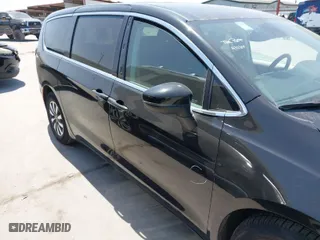 2023 Chrysler Pacifica Hybrid Touring L with VIN 2C4RC1L77PR540958, listed as a IAAI auction lot 42010484 with 61,166 mi miles. Bid and sale history available at carsss.com. Image 13.