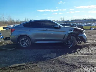 2019 BMW X6 xDrive35i with VIN 5UXKU2C54K0Z64117, listed as a IAAI auction lot 41078385 with 119,193 mi miles. Bid and sale history available at carsss.com. Image 13.