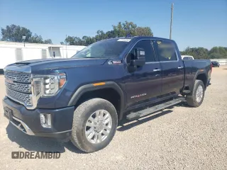 2020 GMC Sierra 2500HD Denali z VIN 1GT49REY7LF327152, wystawiony jako Copart lot #77454054 z przebiegiem 32 739 mil mil oraz Czysty tytuł • Clean title. Historia ofert i sprzedaży dostępna na DreamBid. Obrazek 1.
