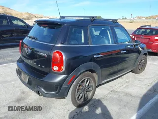 2015 MINI Countryman S with VIN WMWZC3C55FWT04354, listed as a IAAI auction lot 41346143 with Not provided miles and . Bid and sale history available at DreamBid. Image 4.