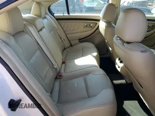 2015 Ford Taurus Limited z VIN 1FAHP2J8XFG123759, wystawiony jako Copart lot #50548205 z przebiegiem 128 266 mil mil oraz Szkoda całkowita • Salvage title. Historia ofert i sprzedaży dostępna na DreamBid. Obrazek 10.